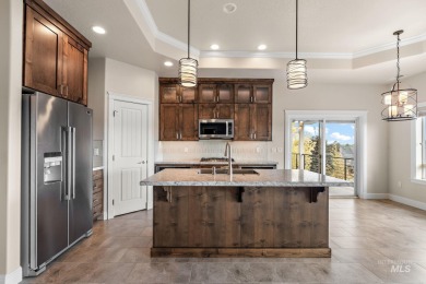 Spacious and thoughtfully designed, this 4-bedroom, 3.5-bath on Hunters Point Golf Club in Idaho - for sale on GolfHomes.com, golf home, golf lot