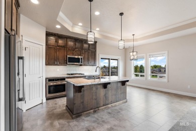 Spacious and thoughtfully designed, this 4-bedroom, 3.5-bath on Hunters Point Golf Club in Idaho - for sale on GolfHomes.com, golf home, golf lot