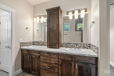 Spacious and thoughtfully designed, this 4-bedroom, 3.5-bath on Hunters Point Golf Club in Idaho - for sale on GolfHomes.com, golf home, golf lot