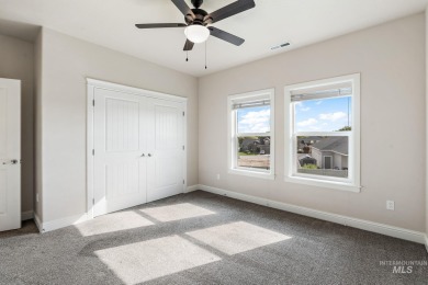 Spacious and thoughtfully designed, this 4-bedroom, 3.5-bath on Hunters Point Golf Club in Idaho - for sale on GolfHomes.com, golf home, golf lot