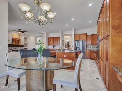 Style and sophistication from the moment you arrive! This TW on Estrella Mountain Ranch Golf Course in Arizona - for sale on GolfHomes.com, golf home, golf lot