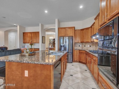 Style and sophistication from the moment you arrive! This TW on Estrella Mountain Ranch Golf Course in Arizona - for sale on GolfHomes.com, golf home, golf lot