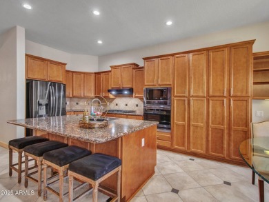 Style and sophistication from the moment you arrive! This TW on Estrella Mountain Ranch Golf Course in Arizona - for sale on GolfHomes.com, golf home, golf lot