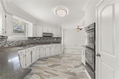 Enjoy Kenner living with a private backyard retreat designed for on Chateau Golf and Country Club in Louisiana - for sale on GolfHomes.com, golf home, golf lot