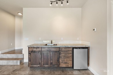 Spacious and thoughtfully designed, this 4-bedroom, 3.5-bath on Hunters Point Golf Club in Idaho - for sale on GolfHomes.com, golf home, golf lot