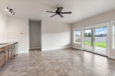 Spacious and thoughtfully designed, this 4-bedroom, 3.5-bath on Hunters Point Golf Club in Idaho - for sale on GolfHomes.com, golf home, golf lot