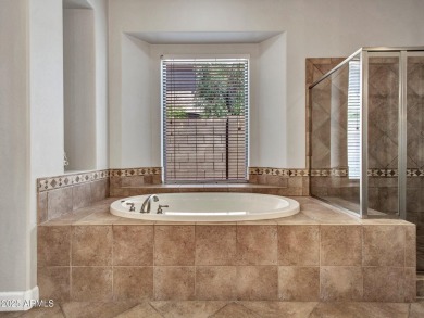 Style and sophistication from the moment you arrive! This TW on Estrella Mountain Ranch Golf Course in Arizona - for sale on GolfHomes.com, golf home, golf lot