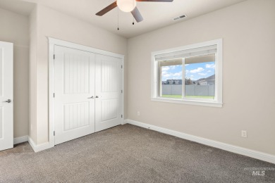 Spacious and thoughtfully designed, this 4-bedroom, 3.5-bath on Hunters Point Golf Club in Idaho - for sale on GolfHomes.com, golf home, golf lot