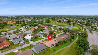 YOU MUST SEE THIS HOME TO APPRECIATE IT! BEAUTIFUL 3 BEDROOM / 2 on Woodmont Country Club in Florida - for sale on GolfHomes.com, golf home, golf lot