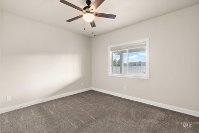 Spacious and thoughtfully designed, this 4-bedroom, 3.5-bath on Hunters Point Golf Club in Idaho - for sale on GolfHomes.com, golf home, golf lot