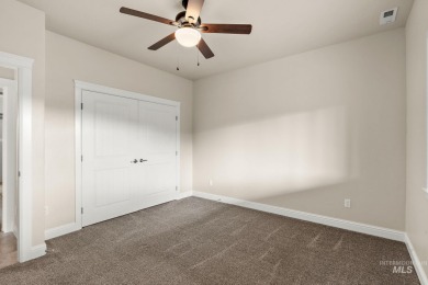 Spacious and thoughtfully designed, this 4-bedroom, 3.5-bath on Hunters Point Golf Club in Idaho - for sale on GolfHomes.com, golf home, golf lot