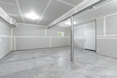 Spacious and thoughtfully designed, this 4-bedroom, 3.5-bath on Hunters Point Golf Club in Idaho - for sale on GolfHomes.com, golf home, golf lot