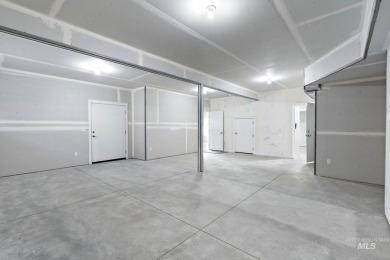Spacious and thoughtfully designed, this 4-bedroom, 3.5-bath on Hunters Point Golf Club in Idaho - for sale on GolfHomes.com, golf home, golf lot