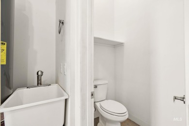 Spacious and thoughtfully designed, this 4-bedroom, 3.5-bath on Hunters Point Golf Club in Idaho - for sale on GolfHomes.com, golf home, golf lot