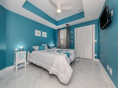 Modern, chic, first floor condo that is 3 years young and ready on Bird Bay Executive Golf Club in Florida - for sale on GolfHomes.com, golf home, golf lot