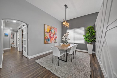 Welcome to a masterfully reimagined residence in the prestigious on Winston Trails Golf Course in Florida - for sale on GolfHomes.com, golf home, golf lot