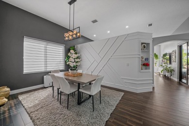 Welcome to a masterfully reimagined residence in the prestigious on Winston Trails Golf Course in Florida - for sale on GolfHomes.com, golf home, golf lot