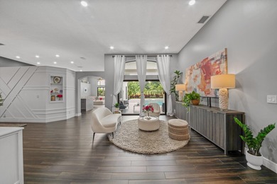 Welcome to a masterfully reimagined residence in the prestigious on Winston Trails Golf Course in Florida - for sale on GolfHomes.com, golf home, golf lot