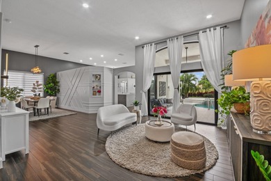 Welcome to a masterfully reimagined residence in the prestigious on Winston Trails Golf Course in Florida - for sale on GolfHomes.com, golf home, golf lot