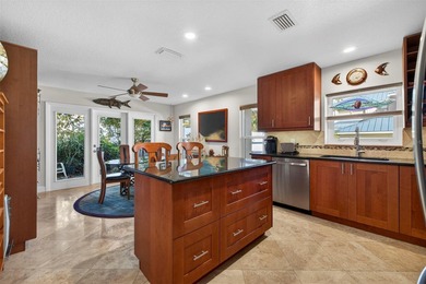 Thoughtfully updated end-unit residence in the desirable on Mangrove Bay Golf Course in Florida - for sale on GolfHomes.com, golf home, golf lot
