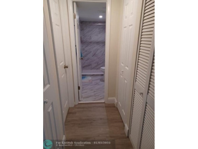 Charming 2 Bedroom /2 Bath Lake View Condominium. Modern kitchen on Sunrise Lakes Phase III in Florida - for sale on GolfHomes.com, golf home, golf lot
