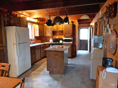 Among the serene wooded pines, this cozy, rustic cabin is a on Terrace Lakes Golf Resort in Idaho - for sale on GolfHomes.com, golf home, golf lot