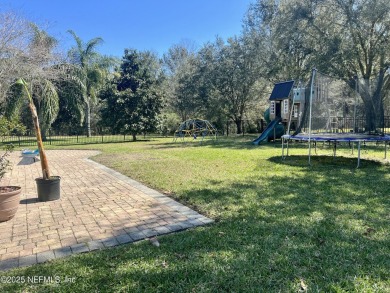 This large and unique home is a must see! It has a huge private on King and Bear Golf Course/World Golf Village in Florida - for sale on GolfHomes.com, golf home, golf lot