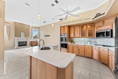 Experience peaceful comfort and style in one of the most on Suntree Country Club in Florida - for sale on GolfHomes.com, golf home, golf lot