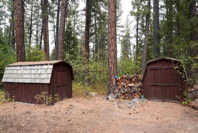 Among the serene wooded pines, this cozy, rustic cabin is a on Terrace Lakes Golf Resort in Idaho - for sale on GolfHomes.com, golf home, golf lot
