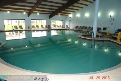 Charming 2 Bedroom /2 Bath Lake View Condominium. Modern kitchen on Sunrise Lakes Phase III in Florida - for sale on GolfHomes.com, golf home, golf lot