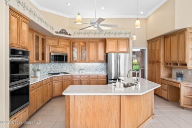 Experience peaceful comfort and style in one of the most on Suntree Country Club in Florida - for sale on GolfHomes.com, golf home, golf lot