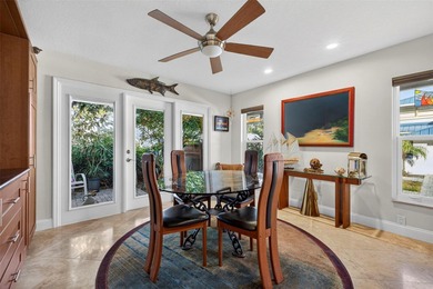 Thoughtfully updated end-unit residence in the desirable on Mangrove Bay Golf Course in Florida - for sale on GolfHomes.com, golf home, golf lot