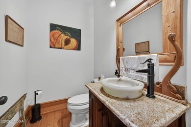 Spectacular riverfront estate on 3 acres along the Towaliga on The Club River Forest in Georgia - for sale on GolfHomes.com, golf home, golf lot