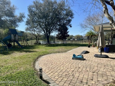 This large and unique home is a must see! It has a huge private on King and Bear Golf Course/World Golf Village in Florida - for sale on GolfHomes.com, golf home, golf lot