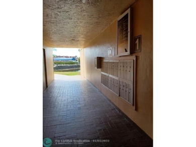Charming 2 Bedroom /2 Bath Lake View Condominium. Modern kitchen on Sunrise Lakes Phase III in Florida - for sale on GolfHomes.com, golf home, golf lot