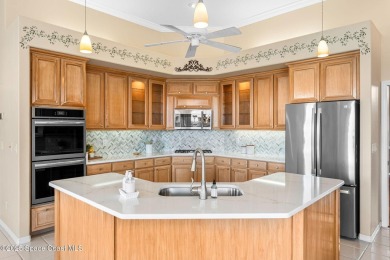 Experience peaceful comfort and style in one of the most on Suntree Country Club in Florida - for sale on GolfHomes.com, golf home, golf lot