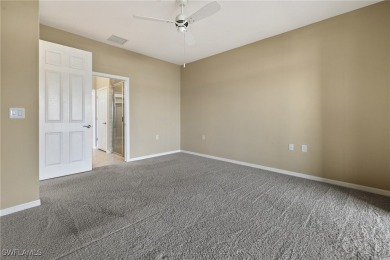 Experience the Florida lifestyle in this charming three-bedroom on Pelican Preserve Golf Club in Florida - for sale on GolfHomes.com, golf home, golf lot