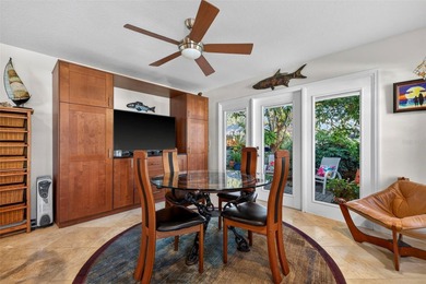 Thoughtfully updated end-unit residence in the desirable on Mangrove Bay Golf Course in Florida - for sale on GolfHomes.com, golf home, golf lot