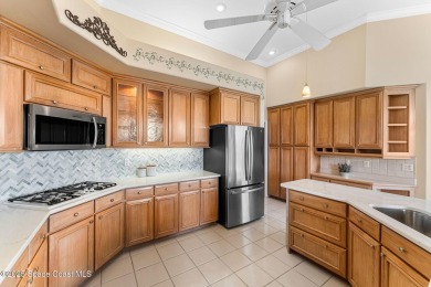 Experience peaceful comfort and style in one of the most on Suntree Country Club in Florida - for sale on GolfHomes.com, golf home, golf lot