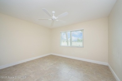 Live the ultimate Florida lifestyle in this popular Raleigh on Indian River Colony Club in Florida - for sale on GolfHomes.com, golf home, golf lot