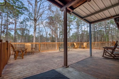 Unparalleled Waterfront Haven nestled on the serene southern on Rayburn Country Club in Texas - for sale on GolfHomes.com, golf home, golf lot