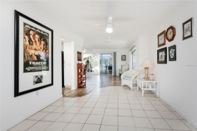 Nature's Backyard: Sunsets, Waterfront Serenity, and Wildlife in on Rotonda Golf and Country Club The Hills Course in Florida - for sale on GolfHomes.com, golf home, golf lot