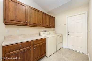 Live the ultimate Florida lifestyle in this popular Raleigh on Indian River Colony Club in Florida - for sale on GolfHomes.com, golf home, golf lot