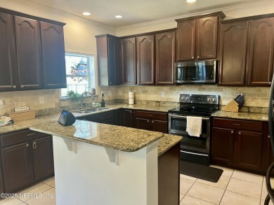 This large and unique home is a must see! It has a huge private on King and Bear Golf Course/World Golf Village in Florida - for sale on GolfHomes.com, golf home, golf lot
