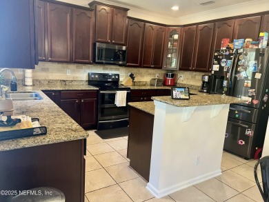 This large and unique home is a must see! It has a huge private on King and Bear Golf Course/World Golf Village in Florida - for sale on GolfHomes.com, golf home, golf lot
