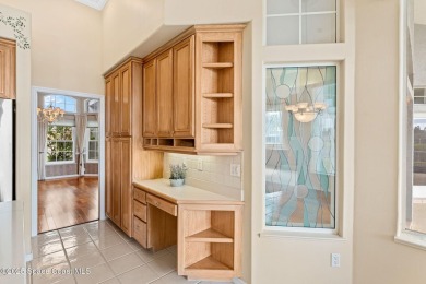 Experience peaceful comfort and style in one of the most on Suntree Country Club in Florida - for sale on GolfHomes.com, golf home, golf lot