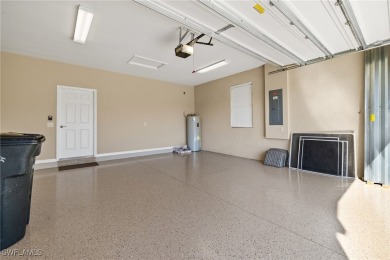 Experience the Florida lifestyle in this charming three-bedroom on Pelican Preserve Golf Club in Florida - for sale on GolfHomes.com, golf home, golf lot