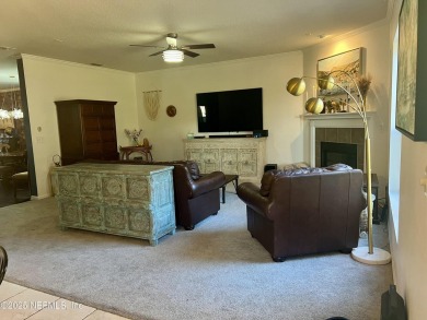 This large and unique home is a must see! It has a huge private on King and Bear Golf Course/World Golf Village in Florida - for sale on GolfHomes.com, golf home, golf lot
