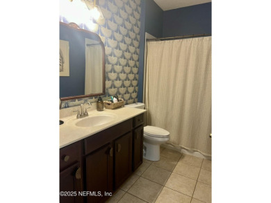 This large and unique home is a must see! It has a huge private on King and Bear Golf Course/World Golf Village in Florida - for sale on GolfHomes.com, golf home, golf lot