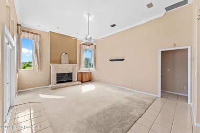 Experience peaceful comfort and style in one of the most on Suntree Country Club in Florida - for sale on GolfHomes.com, golf home, golf lot